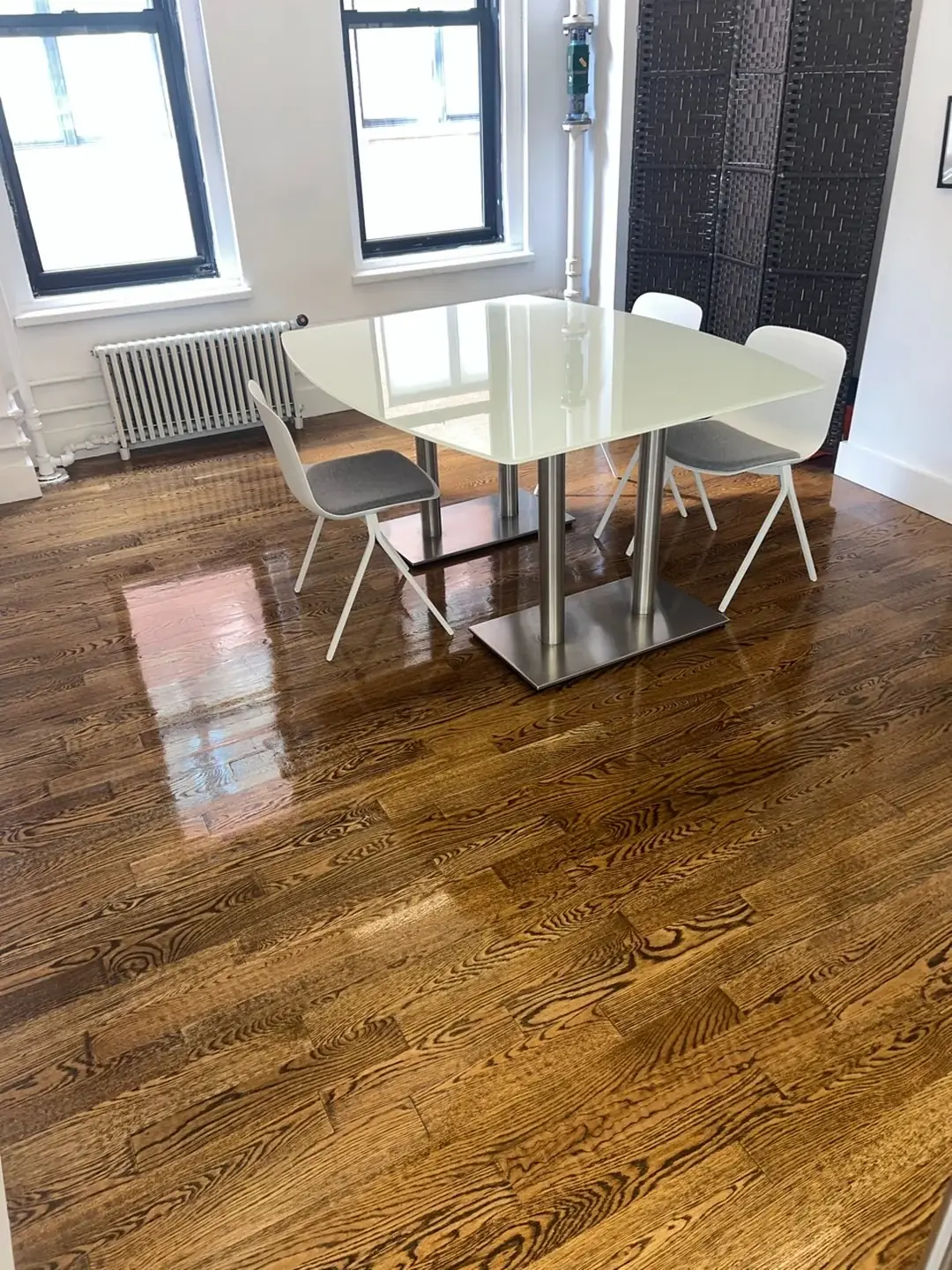 Polished hardwood floor and conference table